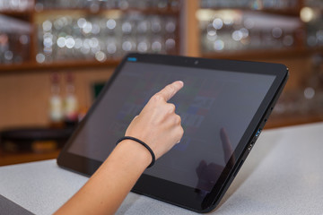 Touchscreen's cash register in the restaurant and commerce store