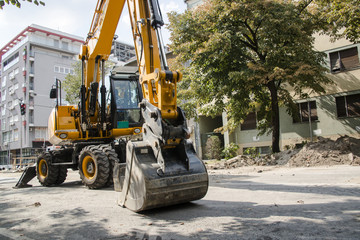 Excavator, hydraulics, tires, screws