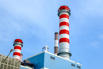 Chimneys against the blue sky.