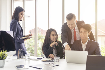 Young business man presented or discuss to client about business project in coference or meeting room.