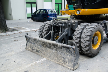 Excavator, hydraulics, tires, screws