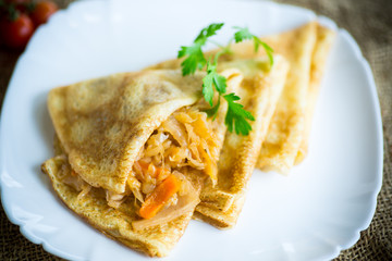 boiled sweet pumpkin porridge with raisins and nuts in a glass bowl