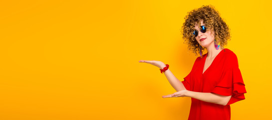 Attractive woman with short curly hair