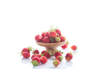 ripe red organic strawberry on a white background