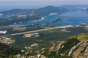 Fototapeta na wymiar Tivat airport and it’s runway in the Bona Kotorska bay in Montenegro