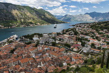 Naklejka na ściany i meble View of the beautiful old town of Kotor in Kotor Bay. Kotor Bay is a bay from the Adriatic sea in southwestern Montenegr and Kotor is one of the UNESCO’s World Heritage Sites