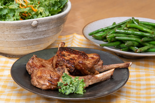 Pan Seared Lamb chops plate with french beans and salad