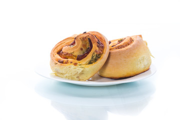 buns in roll form with sausage and stuffing