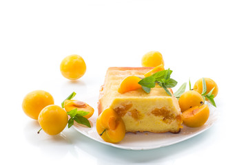 sweet curd casserole stuffed with yellow plums inside