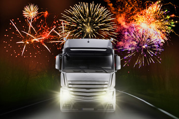 Lastkraftwagen bei Nacht mit Feuerwerk im Hintergrund. - Truck at night with fireworks . New Year...