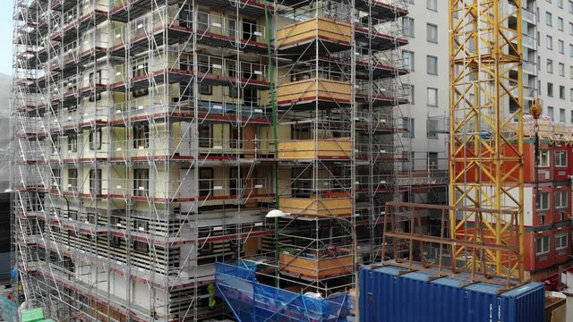 Aerial footage of a construction site / scaffolding in Stockholm, Sweden