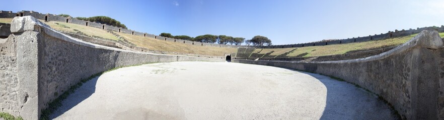 Fototapeta na wymiar Pompei archaeological excavations, Naples, Italy - amphitheater