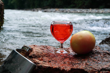 Picture of a metal jar and glasses.