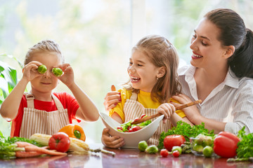 Happy family in the kitchen.