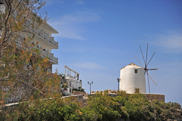 Fototapeta na wymiar Old white windmill on Paros island