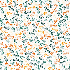 Colorful orange green yellow leaves twigs in seamless pattern background design