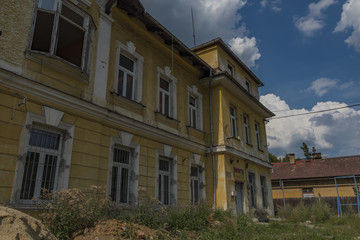 Fototapeta na wymiar Old houses in Olovi village in hot summer day