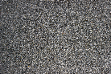 Small Rock Textured background. Seamless texture of gravel. crushed granite texture