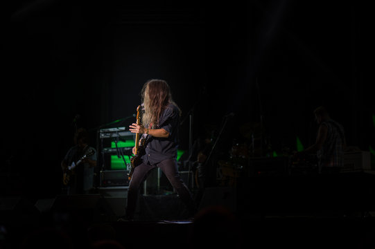 Guitarist on a stage playing rock