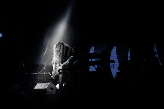 Guitarist on a stage playing rock