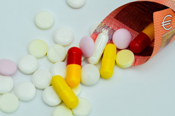 tablets are scattered on the table, dosage for the patient