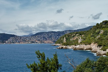 Fototapeta na wymiar Hiking the beautiful trail along the sea in St Jean Cap Ferrat, French Riviera