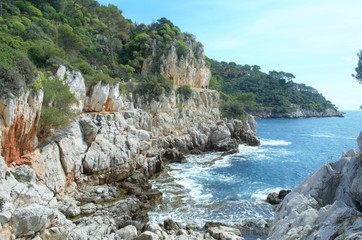 Hiking the beautiful trail along the sea in St Jean Cap Ferrat, French Riviera