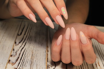 Obraz na płótnie Canvas fashionable beige manicure