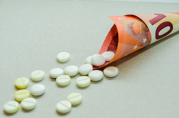 tablets are scattered on the table, dosage for the patient
