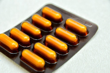 tablets are scattered on the table, dosage for the patient
