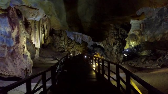 motion along staircase to huge karst cavern depth