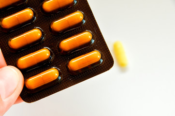 tablets are scattered on the table, dosage for the patient