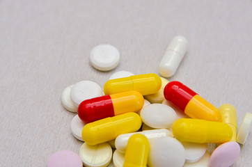 tablets are scattered on the table, dosage for the patient