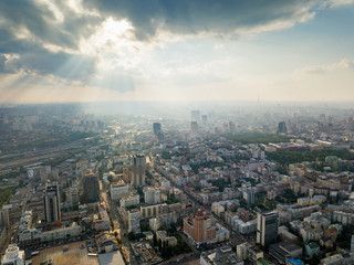Fototapeta premium Aerial view of Kiev cityscape, Ukraine with historical and modern building on a beautiful summer sunset. Aerial view from drone.