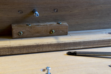 Self assembly bookcase pine flat pack furniture being assembled