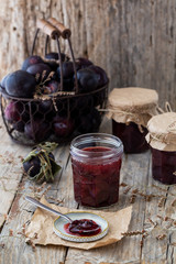 Plum jam in a preserving glass