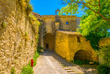 Narrow street in Gordes village in France