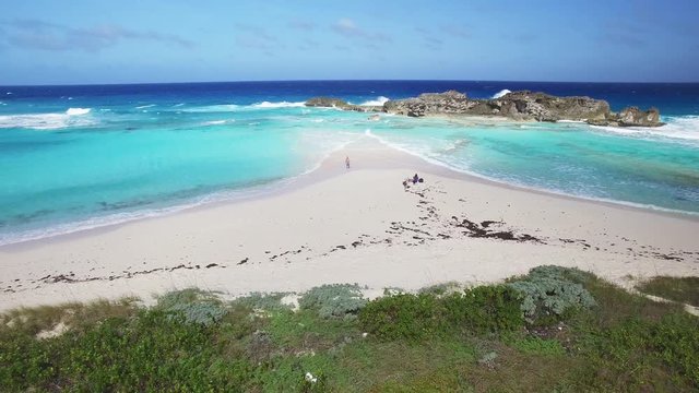 Waves crash on beach in Turks and Caicos, aerial