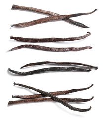 Set with vanilla pods on white background