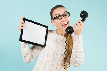 Attractive woman with ponytail and tablet