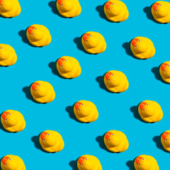 Collection of yellow rubber ducks on a blue background