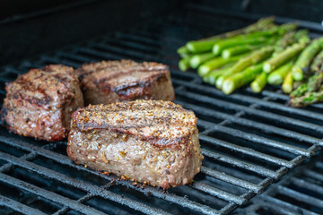 Steak and asparagus on the grill