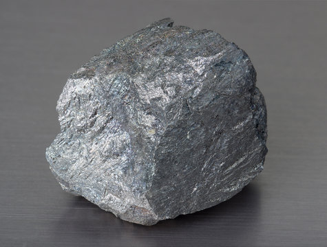 Specimen of mineral iron ore on gray background