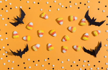 Halloween paper bats overhead view on a solid color