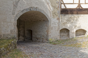 Fototapeta na wymiar The entrance gate to the old castle.