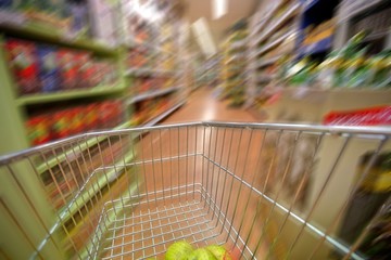 Inside View of Shopping Cart Full of Groceries with Motion Blur