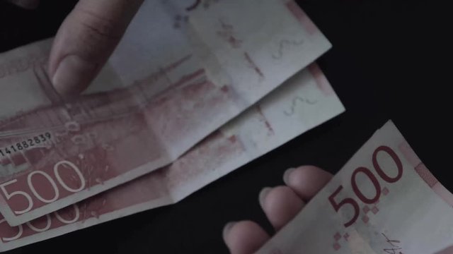 Swedish Krona counted on a table