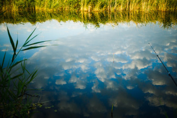 Fototapeta premium Clouds reflected in the lake.