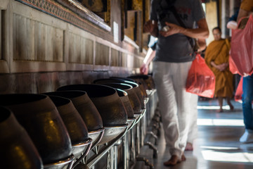 Donations in the Temple of the Reclining Buddha