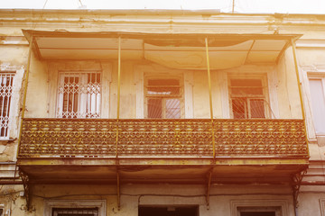 Old Tbilisi architecture, window and exterior decor in summer day.